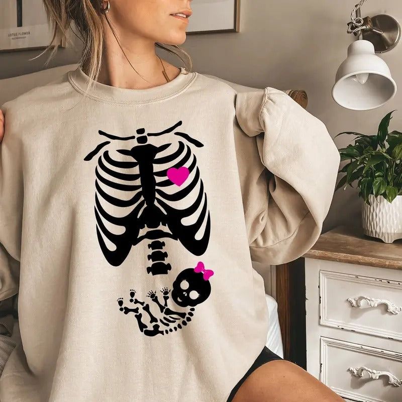 Baby Girl X-Ray Skeleton Sweatshirt, Halloween Skeleton Pregnancy Announcement Sweatshirt, Pregnant Skeleton Sweatshirt, Funny Maternity Sweatshirt, Halloween Maternity Sweatshirt, New Mom Fall Halloween Thanksgiving Maternity Gift Shirt