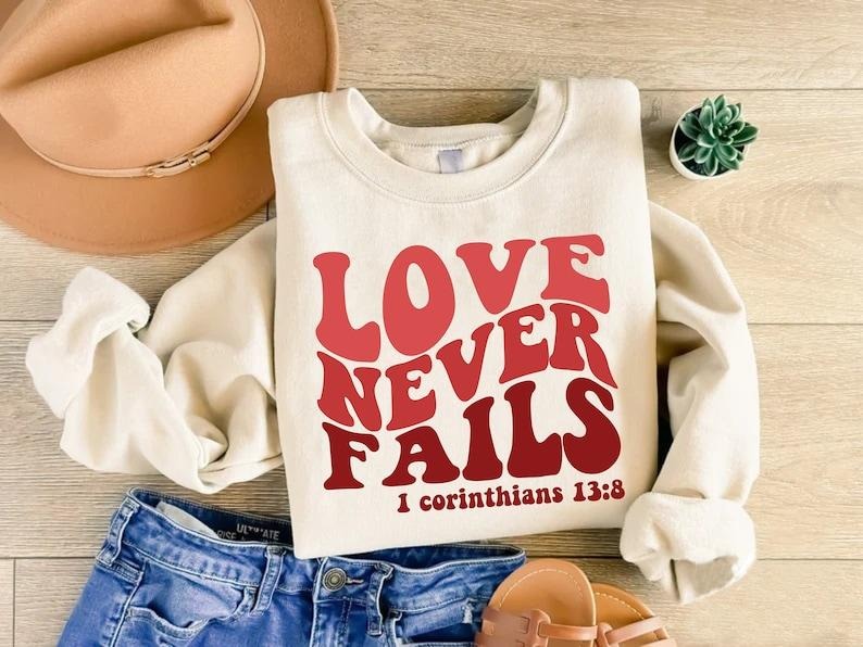 Bible Verse Christian Sweatshirt, Love Never Fails Sweatshirt, Valentines Day Gift, Religious Love Sweatshirt, Jesus Love Hoodie and Sweater; T-shirt Cotton Menswear