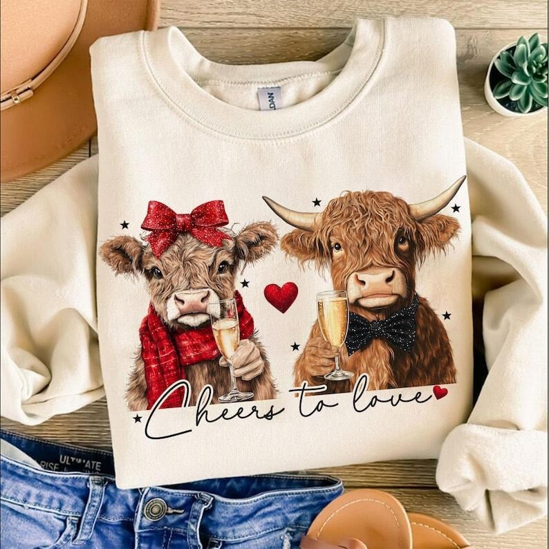 Cheers to love Highland Cow Valentine Sweatshirt ,Coquette,Trending ,Girly Valentine T-Shirts, Hoodie | WearSparks.com
