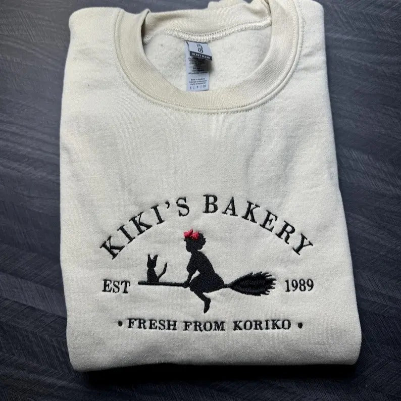 Embroidered KiKi's Bakery Unisex Crewneck Sweatshirt, Jiji Shirt, Kiki's Delivery Service, Studio Ghibli Sweatshirt, Hayao Miyazaki Shirt