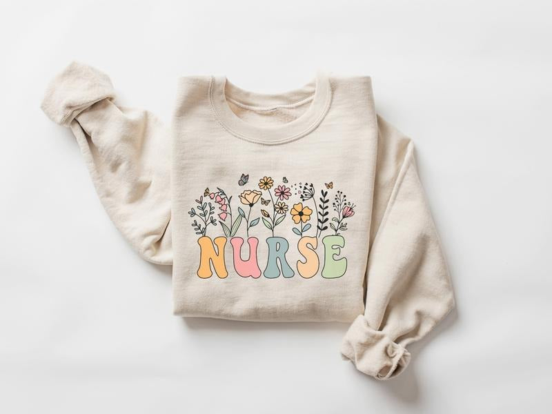 Floral Nurse Sweatshirt, Wildflower Nurse Shirt, Nursing Tee, Nurse Graduation Gift, ER RN Gift For Nurse Week Shirt, Nurse Appreciation Shirt, Nurse Shirt