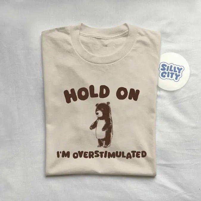 Hold On I'm Overstimulated - Unisex sweater and hoodie