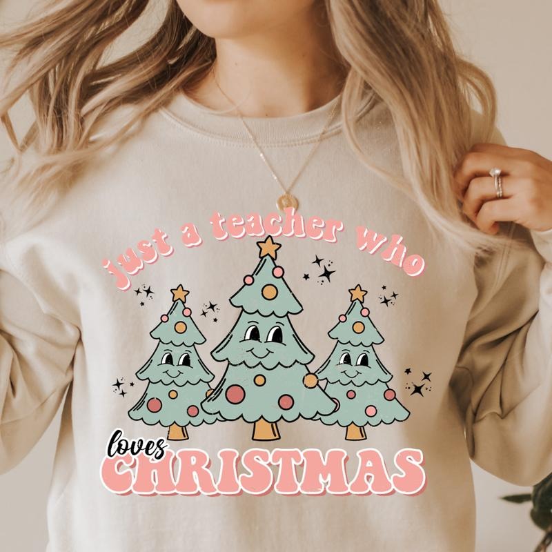 JUST A TEACHER WHO LOVES CHRISTMAS CREWNECK (Crewneck Sweatshirt, Unisex Fit, Causal Sweatshirt for Christmas, Christmas Holiday Sweatshirt) Womenswear Hoodie