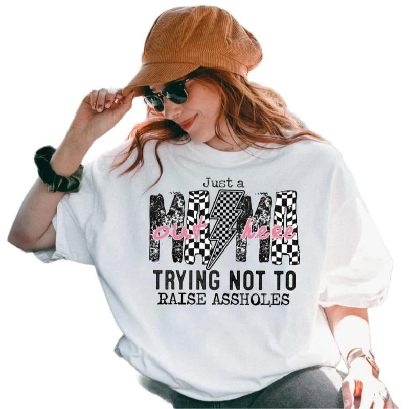 Just A Mom Out Here Trying Not To Raise 4ssholes Shirt, Funny Mothers Day Gift, Sassy Mama life Shirt, Motherhood Sarcasm Tee, Regular Fit Short Sleeve Tee, Crewneck Top