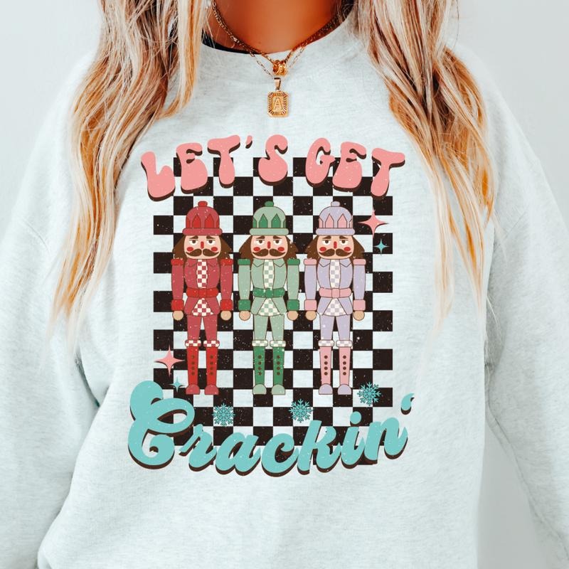 LET'S GET CRACKIN' CREWNECK (Crewneck Sweatshirt, Unisex Fit, Causal Sweatshirt for Christmas, Christmas Holiday Sweatshirt) Polyester Womenswear