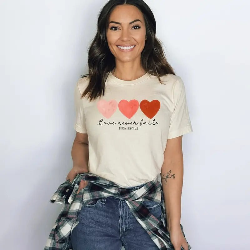 Love Never Fails Graphic Tee - BELLA+CANVAS Tee - Christian Shirt Hoodie, Sweatshirt | WearSparks.com