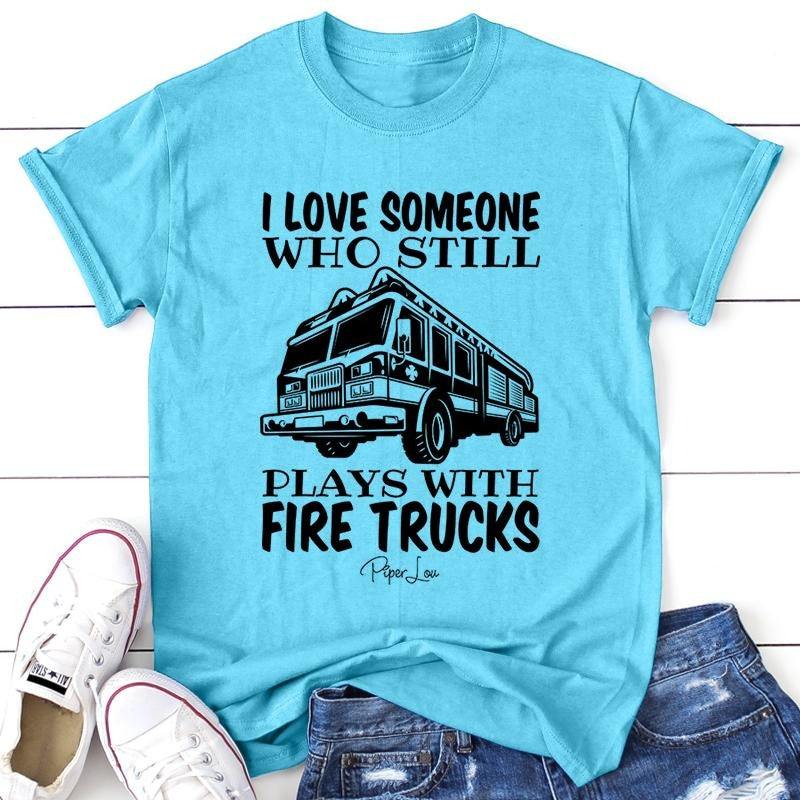 FLASH SALE | I Love Someone Who Still Plays With Firetrucks Apparel, Printed In The USA, Tee / Tank / V Neck Gray / White / Blue / Hot Pink / Orange, #sassy #cute #blackprint