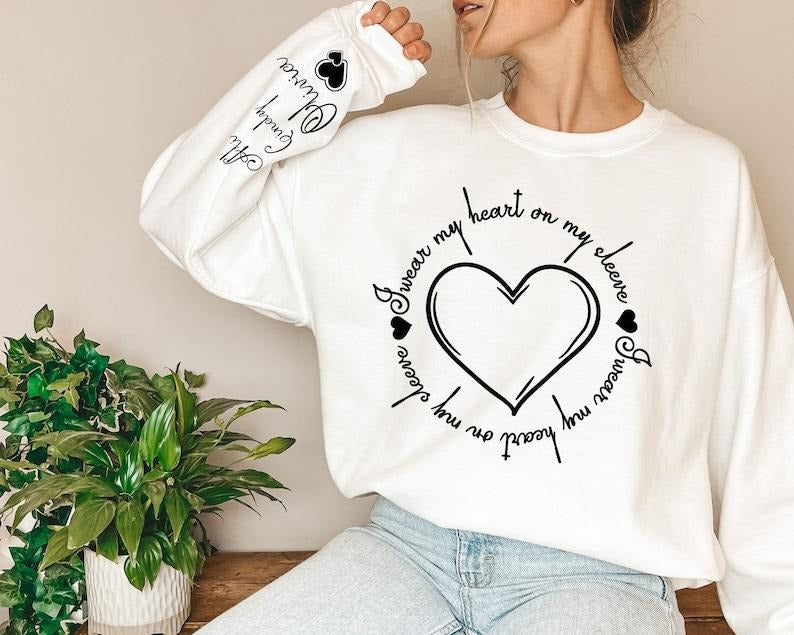 Personalized I Wear My Heart On My Sleeve Sweatshirt & Hoodie, Gift for Mom, Mama Sweatshirt with Children Name on Sleeve, Mothers Day Gift, Mom Crewneck Hoodie, Heart on my sleeve