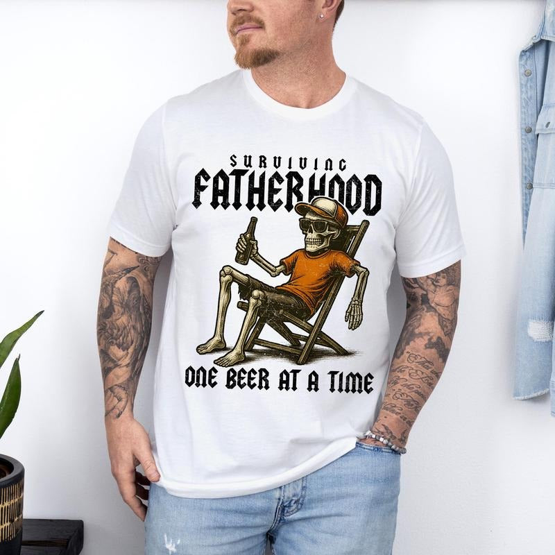 Surviving Fatherhood One Beer At A Time Shirt Funny Dad Shirt Skeleton Dad Shirt Drinking Husband Fatherhood Shirt...