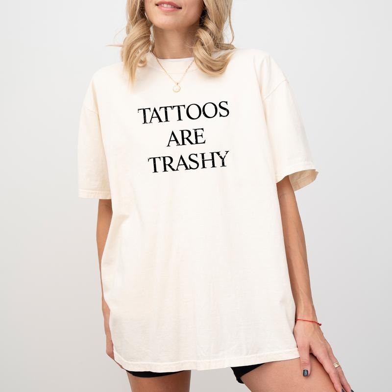 Tattoos Are Trashy Tee, Tattoos Lover Gift Shirt, Tattoos Are Stupid Graphic Printed Shirt, Tattoo Addict Shirt, Love Tattoos Tee, Sarcastic Anti Tattoo Tee, Comfy Fabric Graphic Tee, Women's Top, Streetwear, Soft Cotton Fabric Relaxed Fit Chic Style