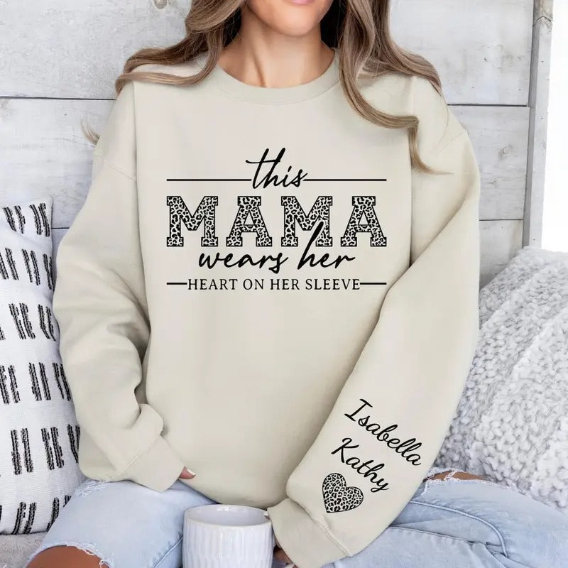 This Mama Wears Her Heart On Her Sleeve Sweatshirt for Mothers Day, Custom Mama Sweatshirt with kids Name on Sleeve, Mother Day Gift for Mom, I Wear My Heart On My Sleeve, Mom Hoodie