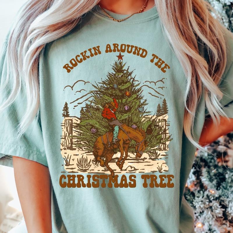 WESTERN ROCKING AROUND #2 T-SHIRT (COMFORT COLORS T-SHIRT, CASUAL SHIRT UNISEX, CHRISTMAS CLOTHING, GRAPHIC APPAREL, HOLIDAY SHIRT) Cotton Fabric