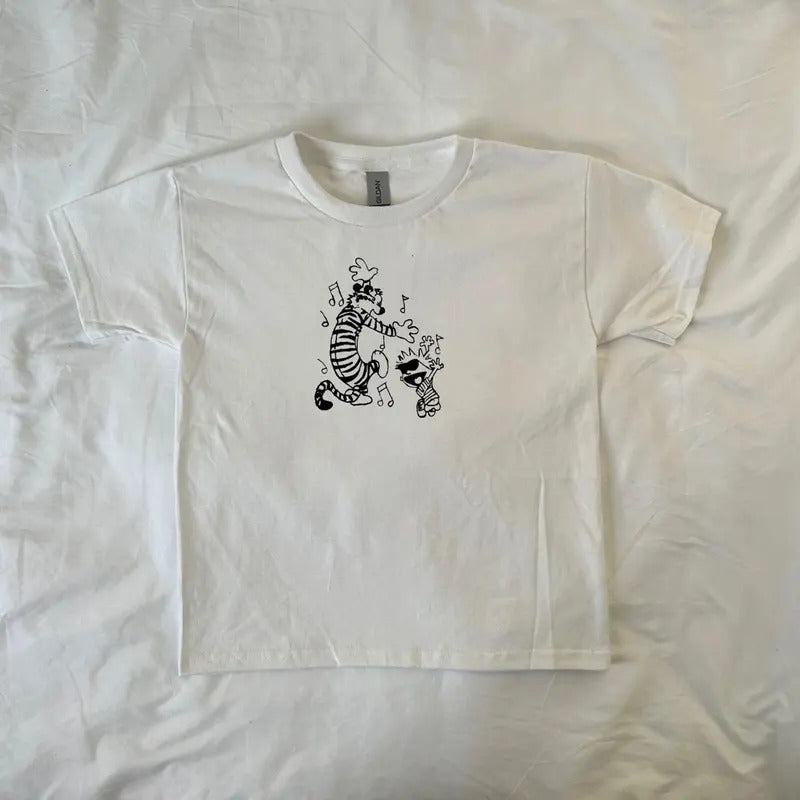 Calvin and Hobbes baby tee, Vintage-Style Cartoon T-Shirt, streetwear clothing, Pinterest, retro, comic duo, 90s style