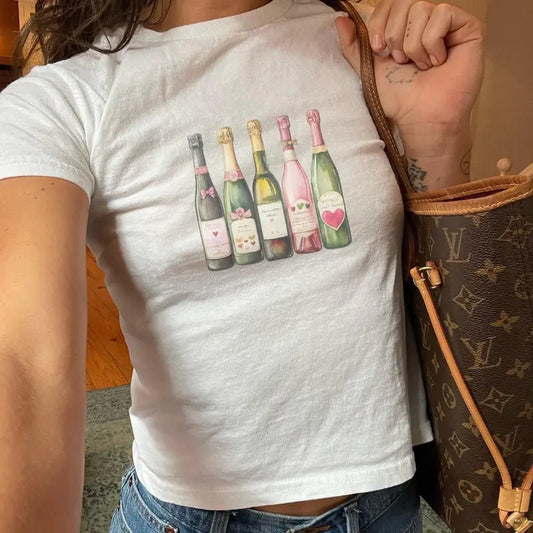 Champagne Bottle Baby Tee for Women - Pop Champagne Celebration T-Shirt - Comfort, Casual Top Womenswear