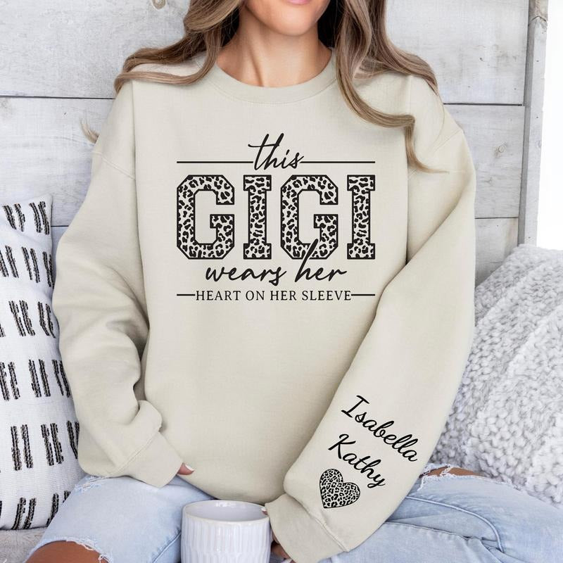 Custom Gigi Sweatshirt, Custom Grandma Gift, This Gigi Wears Her Heart On Her Sleeve Sweater, With Kids Name On Sleeve, Gigi Sweater, Gigi Gift