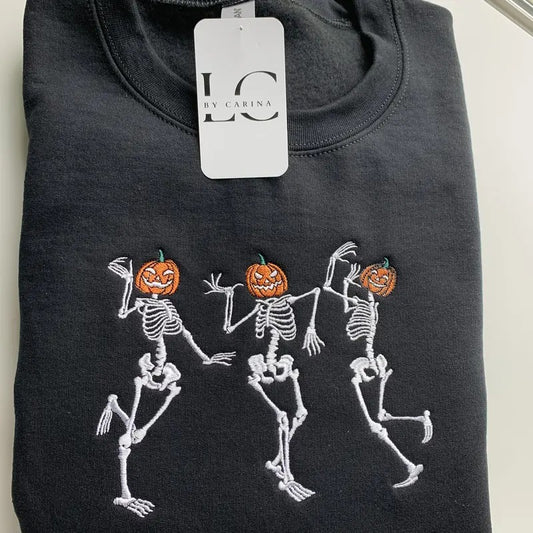 Dancing Skeletons Embroidered Sweatshirt | Halloween Skeleton Shirt | Cozy Fall Sweatshirt | Spooky Season Apparel | Fun Halloween Gift | Unisex Sweatshirt