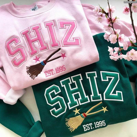 Embroidered Shiz Sweatshirt, Hoodie, Tee, Wicked Movie Wizard Shiz University Shirt, Best Wickeds Merch Movie Lover Gif , Global Trending Outfits