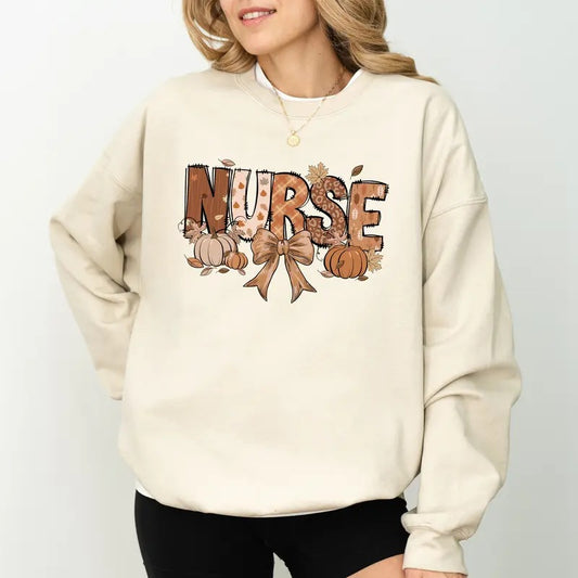 Fall Nurse Sweatshirt, Vintage Coquette Bow Sweatshirt For Nurses, Pumpkin Nurse Crewneck, Autumn Nurse Pullover, Cute Fall Bow Nurse Sweater, Comfy Long Sleeve Pullover, Unhinged Fabric Women's Tops, Fall Autumn Casual Womenswear, Soft Cozy Cotton Tops