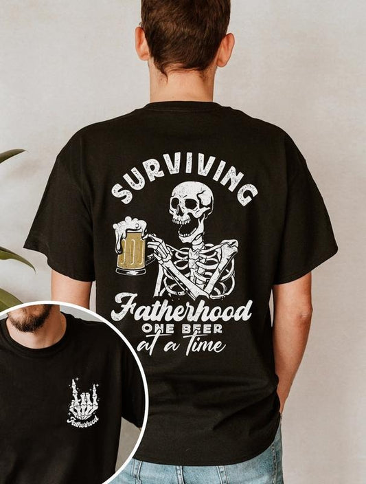 Fatherhood Surviving One Beer At a Time T-Shirt Fatherhood Back & Font Shirts Skull Dad Tee Sarcastic Shirt Gift For Dad Fathers Day Shirt