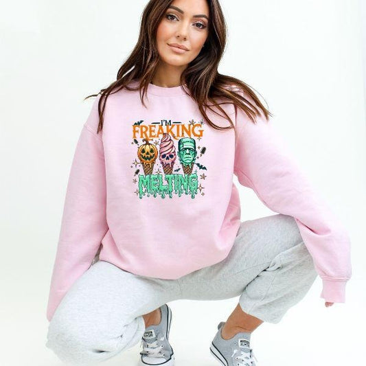 Freaking Melting" Halloween Character Ice Cream Cone Sweatshirt - Retro Vintage Colors, Long Sleeve Crewneck, Unisex Sizing - Available in Sand, Pink, or Ash - Cute Fall Fashion with Feminine Vibe