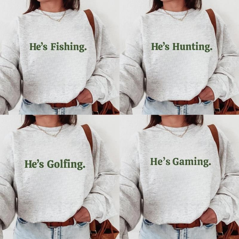 He's Golfing - Fishing - Hunting - Gaming Sweatshirt, Girlfriend Gift, Funny Gift for Dad, Cool Shirt, Outdoor Enthusiast Gift Womenswear Tops