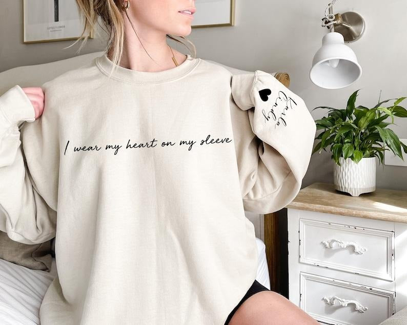 I Wear My Heart On My Sleeve Sweatshirt and Hoodie, Gift for Mom, Custom Mama Sweatshirt with Children Name on Sleeve, MothersDay, Valentine Shirt