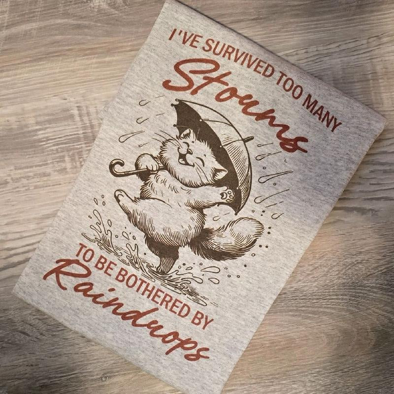 I've survived too many storms to be bothered by raindrops Graphic Tee or Sweatshirt