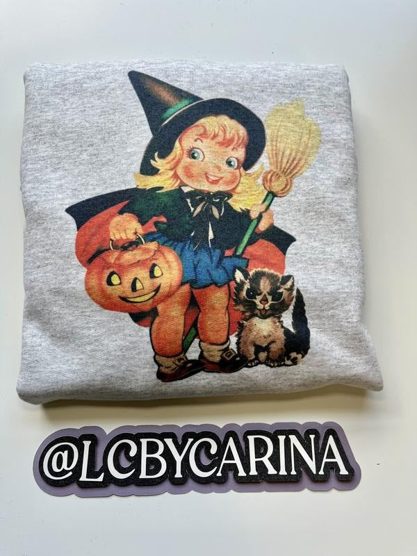 LCbyCarina Vintage Halloween Witch Sweatshirt Retro Sublimated Fall Crew Neck Sweatshirt with Cute Witch Girl Pumpkin & Cat Design Cozy Spooky Season Faded Vintage Look
