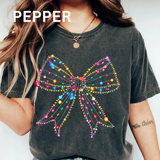 MERRY CHRISTMAS NEON LIGHTS BOW T-SHIRT (COMFORT COLORS T-SHIRT, CASUAL SHIRT UNISEX, CHRISTMAS CLOTHING, GRAPHIC APPAREL, HOLIDAY SHIRT) Cotton Fabric Womenswear Top Printed Oversized Women