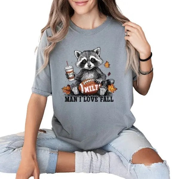 Man I Love Fall Short Sleeve Cewneck T-Shirt for Women, Trendy Fall Everyday Womenswear Style, Casual Autumn Football T Shirt, Comfort TShirt for Raccoon Lovers, Raccoon Shirt, Moms of Football Players T Shirt, Football Season Shirt