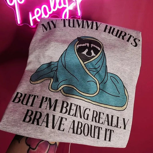 My tummy hurts but I'm being really brave about it Graphic Tee