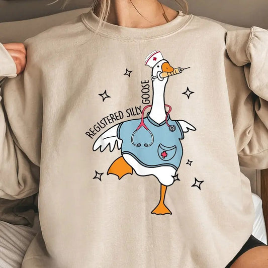 Nurse Silly Goose Sweatshirt, Nursing Student Shirt, Nurse Gift, Nurse Appreciation Shirt, Funny Goose Sweatshirt, Trendy Gift For Him, Trendy Gift For Her, Graphic Printed Unisex Classic Comfort Cotton T-Shirt in all sizes and colors for Men and Women