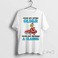 Officials Grinch Youre Not Getting Older Youre Just Becoming A Classic Premium T Shirts Sweater