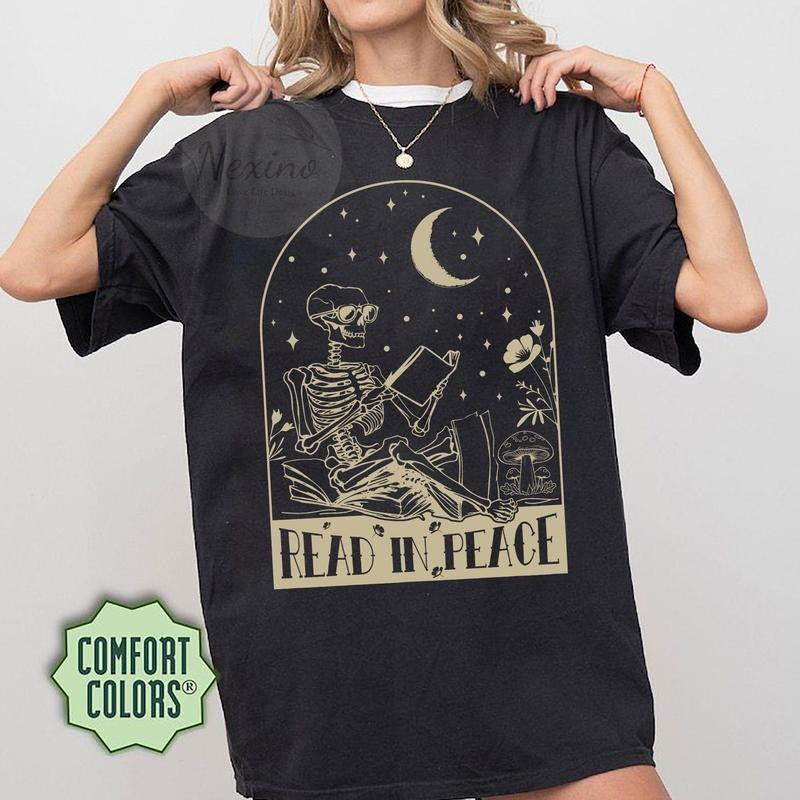 Read in Peace Shirt, Books Shirt, bookish Merch, Reading t-shirt, skeleton readingShirt, Book Lover tshirt, Book Shirt, Halloween Shirtstyle{n002}2