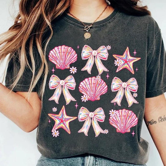 [Sale up To 43%] Comfort Colors Coquette Pearl Bow Shirt, Summer Vibes, Pink Clam Shirt, Summer Beach Shirt Comfortable Fitted