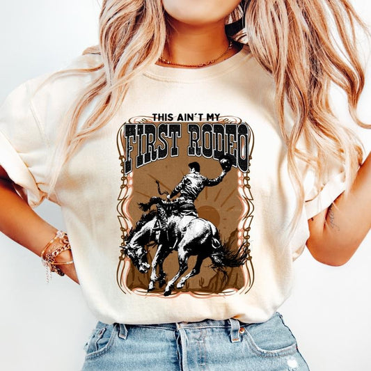 This Ain't My First Rodeo T-Shirt, Country Western Shirt, Retro Vintage Cowgirl tee, Cowgirl Shirt, Cowgirl Western Electric Shirt, Unisex T-shirt, Gifts for Women, Short Sleeve Cotton Casual Shirt Comfort Crewneck Fabric Fashion