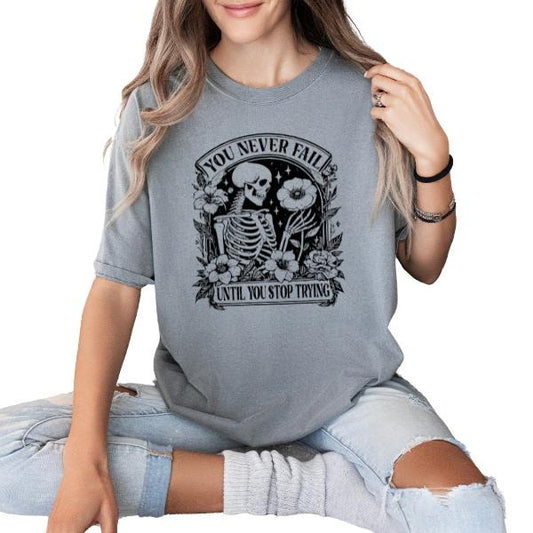 You Never Fail Until You Stop Trying" Grunge Skeleton Sweatshirt - Unisex Sizing in Various Colors | Alternative Style with Uplifting Affirmation | Skeleton Smelling Flowers Design | Positive Vibes for All | Multiple Sizes & Styles | Stay Motivated