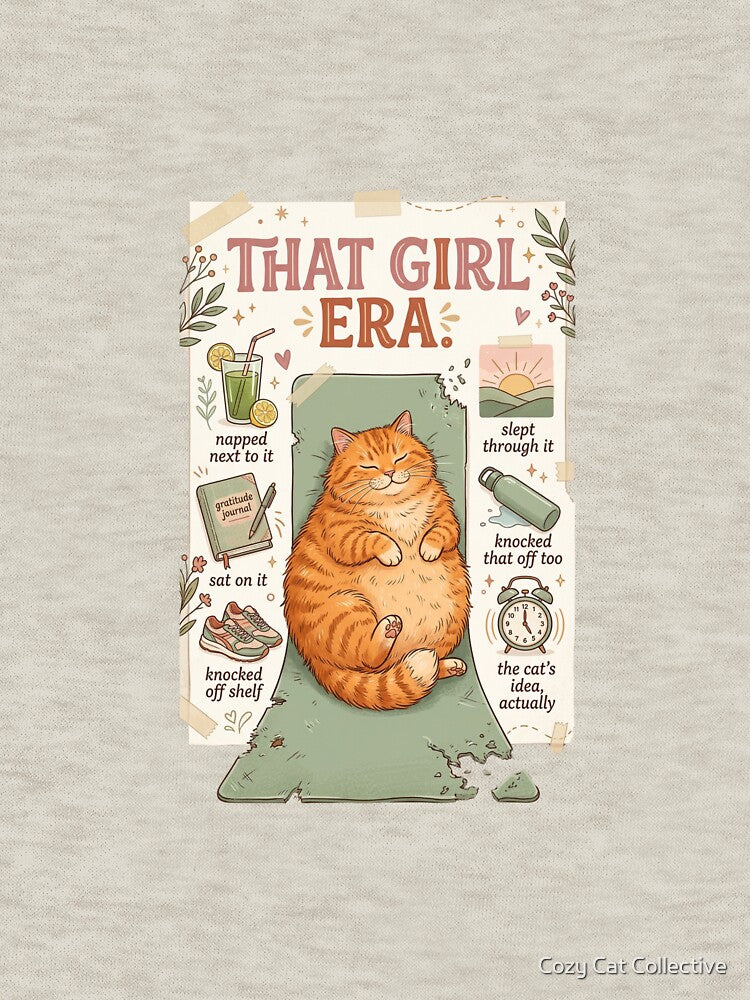 That Girl Era Cat T-Shirt — Funny Wellness Parody Orange Cat On Yoga Mat — Morning Routine Cat Lover Gift — Cozy Relatable Cat Humor Graphic Tee by Cozy Cat Collective