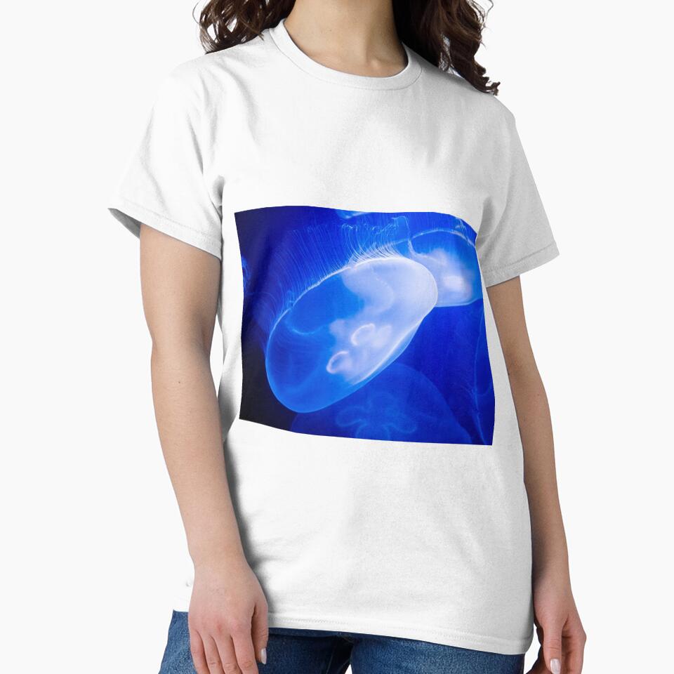 glowing jellyfish in the deep ocean by SherriMans